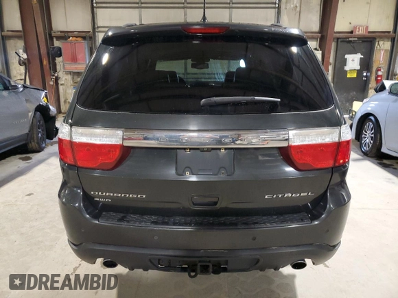2011 Dodge Durango Citadel with VIN 1D4SE5GT4BC613797, listed as a Copart auction lot 54893175 with 196,840 mi miles and Salvage title. Bid and sale history available at DreamBid. Image 6.