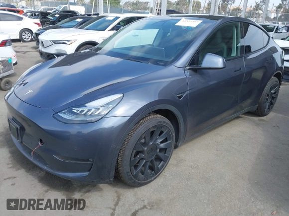2022 Tesla Model Y Long Range z VIN 7SAYGDEE6NF364994, wystawiony jako IAAI lot #42322587 z przebiegiem 41 572 mil mil oraz . Historia ofert i sprzedaży dostępna na DreamBid. Obrazek 21.