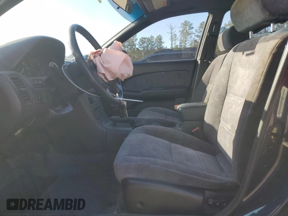 1997 Nissan Maxima GXE с VIN JN1CA21D5VT824575, выставлен на аукционе Copart как лот 85160034 с пробегом 94 387 миль миль и Списание • Salvage title. История ставок и продаж доступна на DreamBid. Изображение 7.