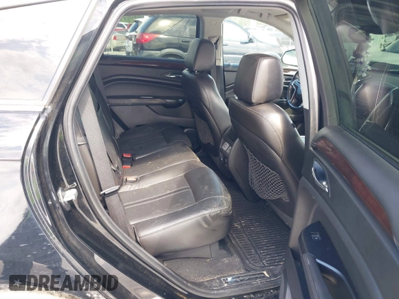 2014 Cadillac SRX Performance Collection с VIN 3GYFNFE38ES656510, выставлен на аукционе IAAI как лот 42336472 с пробегом 125 269 миль миль и . История ставок и продаж доступна на DreamBid. Изображение 8.