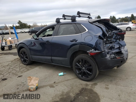 2022 Mazda CX-30 Premium with VIN 3MVDMBDY1NM446064, listed as a Copart auction lot 46527505 with 20,742 mi miles and Salvage Title. Bid and sale history available at DreamBid. Image 2.