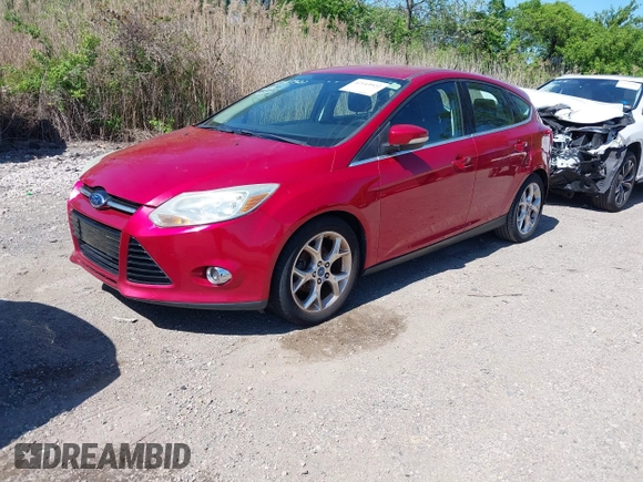2012 Ford Focus SEL with VIN 1FAHP3M22CL335913, listed as a IAAI auction lot 42143922 with 129,421 mi miles. Bid and sale history available at carsss.com. Image 2.
