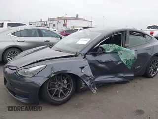 2023 Tesla Model 3 with VIN 5YJ3E1EA4PF705949, listed as a IAAI auction lot 42336682 with 88,056 mi miles and . Bid and sale history available at DreamBid. Image 6.