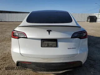 2020 Tesla Model Y Long Range with VIN 5YJYGDEFXLF034617, listed as a Copart auction lot 53235235 with 113,480 mi miles and Salvage Title. Bid and sale history available at DreamBid. Image 6.