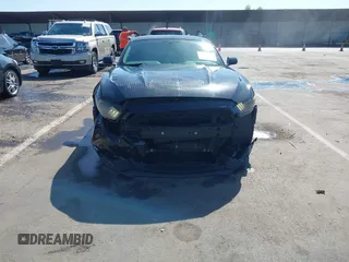 2015 Ford Mustang EcoBoost z VIN 1FA6P8TH4F5377048, wystawiony jako IAAI lot #42234256 z przebiegiem 160 455 mil mil oraz . Historia ofert i sprzedaży dostępna na DreamBid. Obrazek 6.