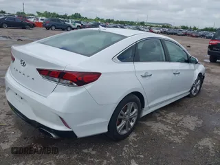 2018 Hyundai Sonata SEL with VIN 5NPE34AF8JH598317, listed as a IAAI auction lot 42214605 with 106,939 mi miles and . Bid and sale history available at carsss.com. Image 4.