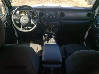 2023 Jeep Wrangler Sport S with VIN 1C4HJXDG3PW635415, listed as a Copart auction lot 48016565 with 31,494 mi miles and Salvage Title. Bid and sale history available at DreamBid. Image 8.