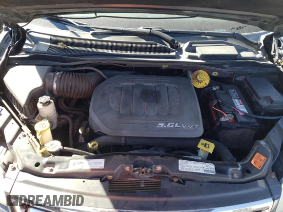 2013 Chrysler Town & Country Touring with VIN 2C4RC1BG9DR810561, listed as a Copart auction lot 72960214 with 100,992 mi miles and Salvage Title. Bid and sale history available at DreamBid. Image 12.