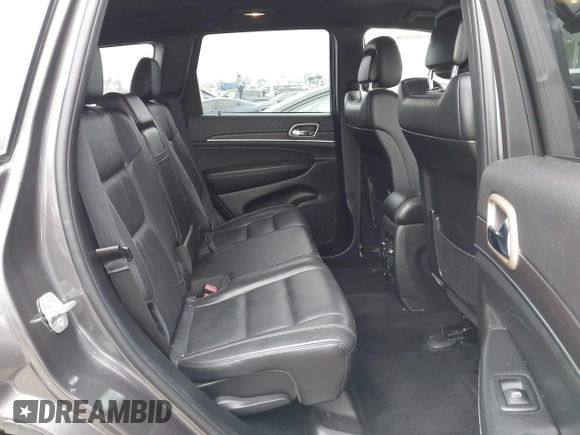 2014 Jeep Grand Cherokee Limited with VIN 1C4RJEBG0EC555774, listed as a IAAI auction lot 42160952 with 102,076 mi miles and . Bid and sale history available at DreamBid. Image 8.