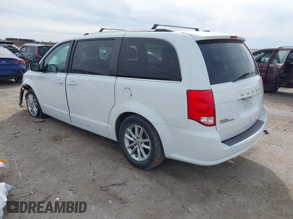2018 Dodge Grand Caravan SXT with VIN 2C4RDGCG2JR283490, listed as a IAAI auction lot 41796929 with 157,836 mi miles and . Bid and sale history available at DreamBid. Image 3.