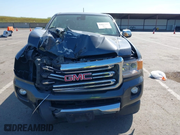 2016 GMC Canyon 4WD SLT with VIN 1GTP6DE15G1323650, listed as a IAAI auction lot 42097101 with 240,662 mi miles. Bid and sale history available at carsss.com. Image 6.