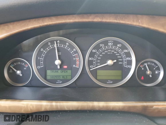2005 Jaguar S-Type with VIN SAJWA01T15FN13800, listed as a Copart auction lot 53576305 with 182,533 mi miles and Salvage Title. Bid and sale history available at DreamBid. Image 9.