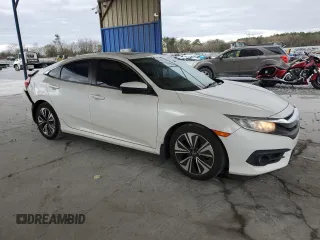 2017 Honda Civic EX-L z VIN 19XFC1F77HE013049, wystawiony jako Copart lot #49931525 z przebiegiem 124 721 mil mil oraz Szkoda całkowita • Salvage title. Historia ofert i sprzedaży dostępna na DreamBid. Obrazek 4.