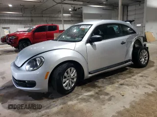 2016 Volkswagen Beetle Wolfsburg Edition with VIN 3VWF17AT3GM602307, listed as a Copart auction lot 56144965 with 63,317 mi miles and Salvage Title. Bid and sale history available at DreamBid. Image 1.