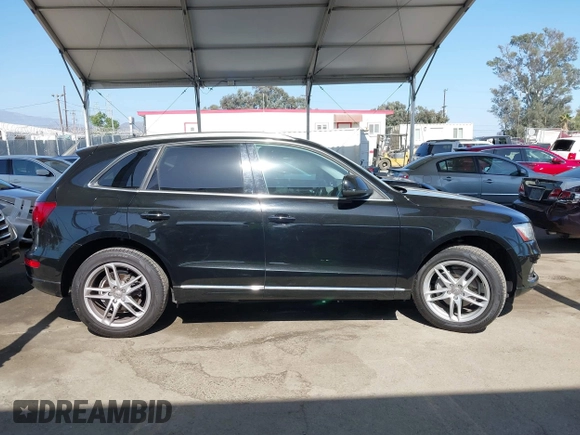 2015 Audi Q5 Premium Plus z VIN WA1LFAFP0FA013351, wystawiony jako IAAI lot #42537653 z przebiegiem 98 842 mil mil oraz . Historia ofert i sprzedaży dostępna na DreamBid. Obrazek 13.