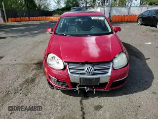 2008 Volkswagen Jetta SE z VIN 3VWRM71KX8M043321, wystawiony jako Copart lot #54168215 z przebiegiem 175 604 mil mil oraz Szkoda całkowita • Salvage title. Historia ofert i sprzedaży dostępna na DreamBid. Obrazek 13.
