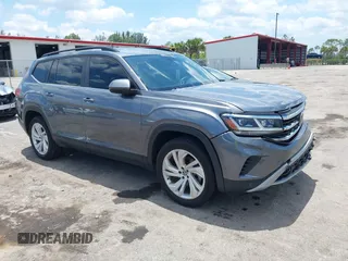 2021 Volkswagen Atlas SE z VIN 1V2HR2CA9MC585740, wystawiony jako IAAI lot #42279757 z przebiegiem 64 995 mil mil oraz . Historia ofert i sprzedaży dostępna na DreamBid. Obrazek 1.