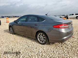 2017 Ford Fusion Hybrid SE with VIN 3FA6P0LU7HR318039, listed as a Copart auction lot 63575325 with 106,355 mi miles and Salvage title. Bid and sale history available at DreamBid. Image 2.
