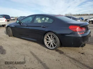 2014 BMW 6 Series 650i z VIN WBA6B2C51ED128896, wystawiony jako Copart lot #84801734 z przebiegiem 142 181 mil mil oraz Szkoda całkowita • Salvage title. Historia ofert i sprzedaży dostępna na DreamBid. Obrazek 2.