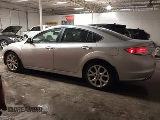 2010 Mazda 6 S Grand Touring with VIN 1YVHZ8CB4A5M08651, listed as a IAAI auction lot 41325049 with 144,834 mi miles and . Bid and sale history available at DreamBid. Image 14.