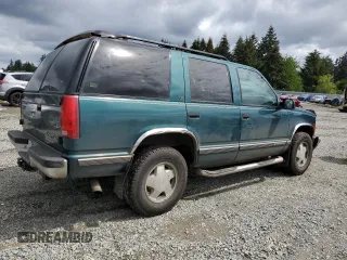 1998 Chevrolet Tahoe z VIN 1GNEK13R2WJ304666, wystawiony jako Copart lot #57833815 z przebiegiem 199 103 mil mil oraz Szkoda całkowita • Salvage title. Historia ofert i sprzedaży dostępna na DreamBid. Obrazek 3.