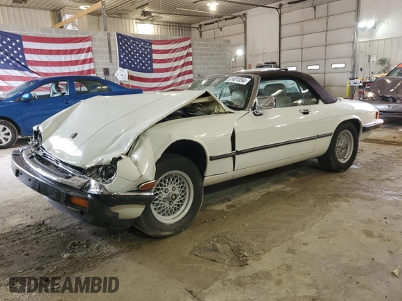 1989 Jaguar XJS z VIN SAJNV4847KC151989, wystawiony jako Copart lot #61401054 z przebiegiem 80 570 mil mil oraz Szkody całkowita. Historia ofert i sprzedaży dostępna na DreamBid. Obrazek 1.