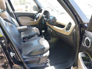 2014 FIAT 500L Lounge with VIN ZFBCFACH3EZ009820, listed as a IAAI auction lot 42294242 with 84,557 mi miles and . Bid and sale history available at DreamBid. Image 5.