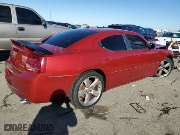 2006 Dodge Charger SRT-8 with VIN 2B3KA73W66H283699, listed as a Copart auction lot 44060975 with 126,105 mi miles and Salvage Title. Bid and sale history available at DreamBid. Image 3.