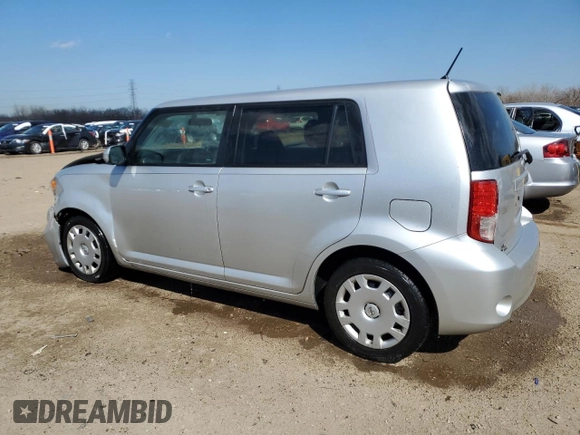 2012 Scion xB with VIN JTLZE4FE1CJ009084, listed as a Copart auction lot 50447785 with 74,155 mi miles and Salvage Title. Bid and sale history available at carsss.com. Image 2.