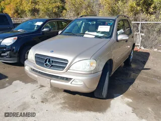 2003 Mercedes-Benz M-Class 3.7L with VIN 4JGAB57E33A414218, listed as a IAAI auction lot 41057534 with 132,342 mi miles. Bid and sale history available at carsss.com. Image 2.