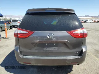 2017 Toyota Sienna LE Auto Access Seat with VIN 5TDKZ3DC1HS820732, listed as a Copart auction lot 54251475 with 104,560 mi miles and Salvage title. Bid and sale history available at DreamBid. Image 6.