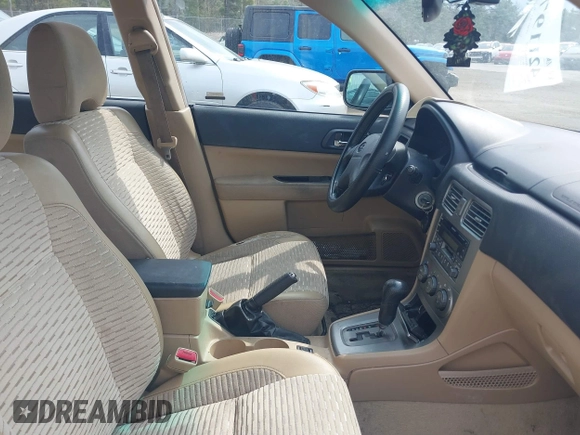 2003 Subaru Forester XS with VIN JF1SG65663H738935, listed as a IAAI auction lot 42119765 with 200,141 mi miles. Bid and sale history available at carsss.com. Image 5.