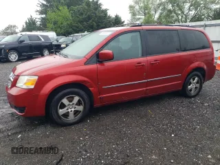 2010 Dodge Grand Caravan SXT z VIN 2D4RN5D10AR179773, wystawiony jako Copart lot #56855235 z przebiegiem 239 925 mil mil oraz Nie do naprawy • Non repairable. Historia ofert i sprzedaży dostępna na DreamBid. Obrazek 1.