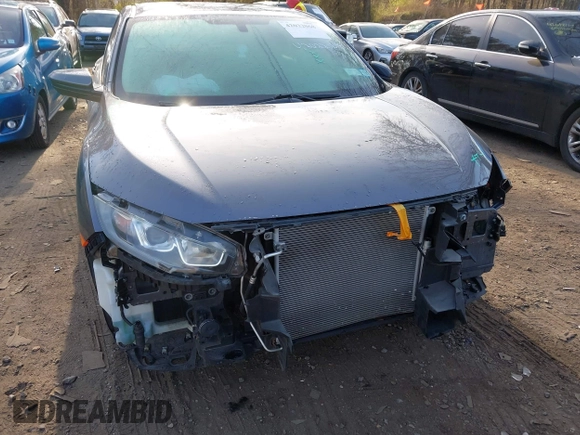 2017 Honda Civic Sedan LX with VIN 19XFC2F56HE233741, listed as a IAAI auction lot 42022068 with 65,587 mi miles. Bid and sale history available at carsss.com. Image 6.
