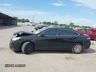 2015 Toyota Camry XLE with VIN 4T1BF1FK7FU037419, listed as a IAAI auction lot 42053259 with 118,453 mi miles and . Bid and sale history available at DreamBid. Image 14.