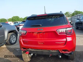 2025 Jeep Compass Trailhawk z VIN 3C4NJDDN0ST551132, wystawiony jako IAAI lot #41905784 z przebiegiem 1 573 mil mil oraz . Historia ofert i sprzedaży dostępna na DreamBid. Obrazek 17.