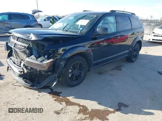 2020 Dodge Journey SE Value with VIN 3C4PDCAB9LT250865, listed as a IAAI auction lot 41601741 with 68,620 mi miles and . Bid and sale history available at DreamBid. Image 2.
