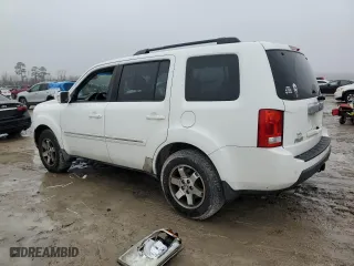 2009 Honda Pilot Touring with VIN 5FNYF38899B017472, listed as a Copart auction lot 42788225 with 118,005 mi miles and Salvage Title. Bid and sale history available at carsss.com. Image 2.