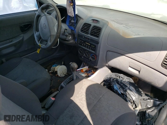 2005 Hyundai Accent GLS with VIN KMHCG35C75U354574, listed as a Copart auction lot 74931444 with 141,013 mi miles and Salvage Title. Bid and sale history available at carsss.com. Image 8.