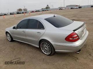 2005 Mercedes-Benz E-Class 5.5L AMG with VIN WDBUF76J05A730404, listed as a Copart auction lot 78168554 with 154,164 mi miles and Clean Title. Bid and sale history available at carsss.com. Image 2.