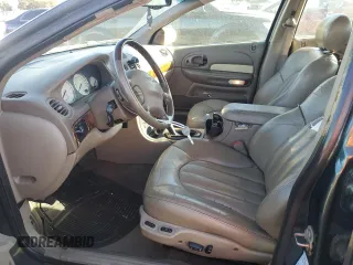 2001 Chrysler LHS z VIN 2C3AC56G31H606648, wystawiony jako Copart lot #77123814 z przebiegiem 83 574 mil mil oraz Tytuł czysty. Historia ofert i sprzedaży dostępna na DreamBid. Obrazek 7.