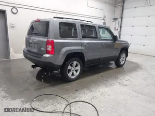 2014 Jeep Patriot Latitude with VIN 1C4NJRFB6ED617208, listed as a IAAI auction lot 41655155 with 92,220 mi miles. Bid and sale history available at carsss.com. Image 4.
