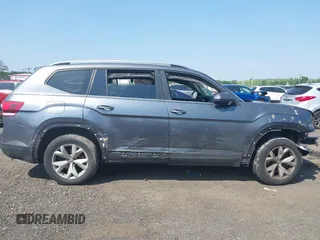 2018 Volkswagen Atlas SE with VIN 1V2KR2CA3JC504717, listed as a IAAI auction lot 42414174 with 105,909 mi miles and . Bid and sale history available at DreamBid. Image 13.