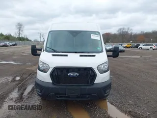 2023 Ford Transit Cargo with VIN 1FTBR1C89PKB29455, listed as a IAAI auction lot 41839680 with 21,570 mi miles. Bid and sale history available at carsss.com. Image 12.