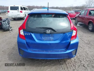 2015 Honda Fit LX with VIN 3HGGK5H52FM710434, listed as a IAAI auction lot 42022022 with 104,118 mi miles. Bid and sale history available at carsss.com. Image 17.