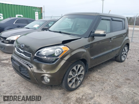 2012 Kia Soul + with VIN KNDJT2A62C7465580, listed as a IAAI auction lot 41717664 with 70,699 mi miles. Bid and sale history available at carsss.com. Image 2.