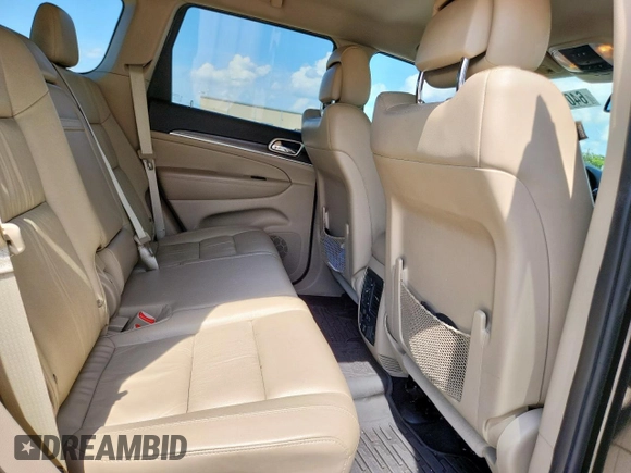 2014 Jeep Grand Cherokee Limited with VIN 1C4RJFBG9EC121990, listed as a Copart auction lot 64079495 with 98,615 mi miles and Salvage title. Bid and sale history available at DreamBid. Image 10.