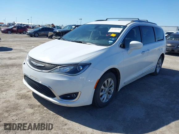 2018 Chrysler Pacifica Touring L with VIN 2C4RC1BG1JR119682, listed as a IAAI auction lot 41762362 with 167,380 mi miles and . Bid and sale history available at DreamBid. Image 17.