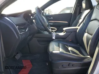 2021 Cadillac XT4 FWD Luxury z VIN 1GYAZAR49MF081955, wystawiony jako Copart lot #76611074 z przebiegiem 34 635 mil mil oraz Szkoda całkowita • Salvage title. Historia ofert i sprzedaży dostępna na DreamBid. Obrazek 7.