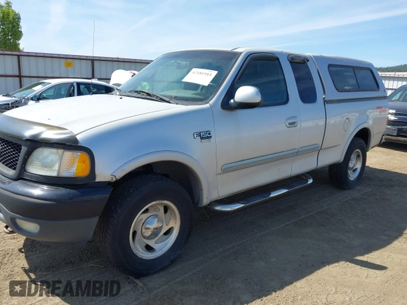 1999 Ford F-150 XL with VIN 2FTRX18LXXCA77730, listed as a IAAI auction lot 42181915 with 240,164 mi miles and . Bid and sale history available at DreamBid. Image 2.
